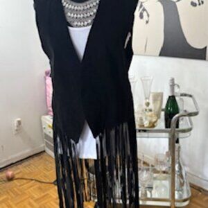 Vintage long fringe suede vest.